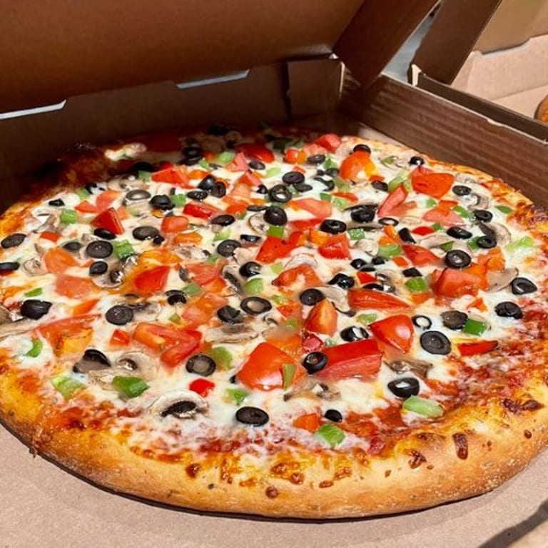 Savor our veggie pizza